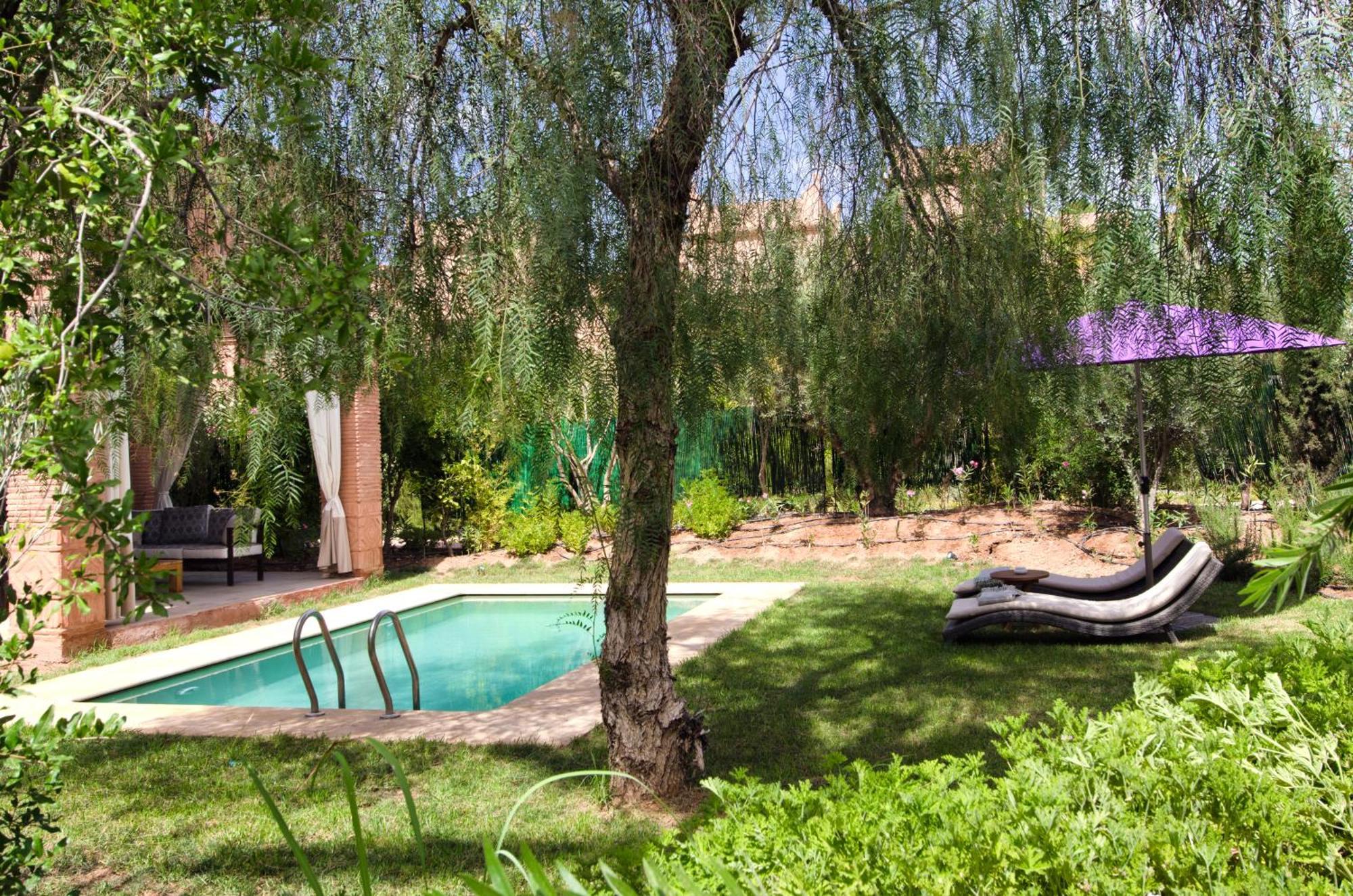 Tigmiza Boutique Hotel & Spa Ouled Jelal Oda fotoğraf The garden of the Riad